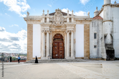 Student walking in University of Coimbra, Portugal