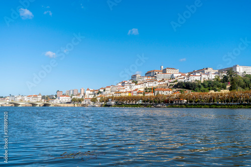 Fototapeta Naklejka Na Ścianę i Meble -  Beautiful old town of Coimbra located on the hill, Portugal