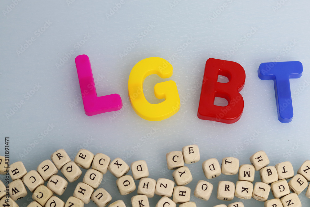 LGBT community symbol on a white background and red heart. Human rights, equality. Sign for lesbians, gays, bisexuals and transgender people. LGBT concept. Copyspace for text. LGBT community symbol on a white background and red heart. Human rights, equality. Sign for lesbians, gays, bisexuals and transgender people. LGBT concept. Copyspace for text.