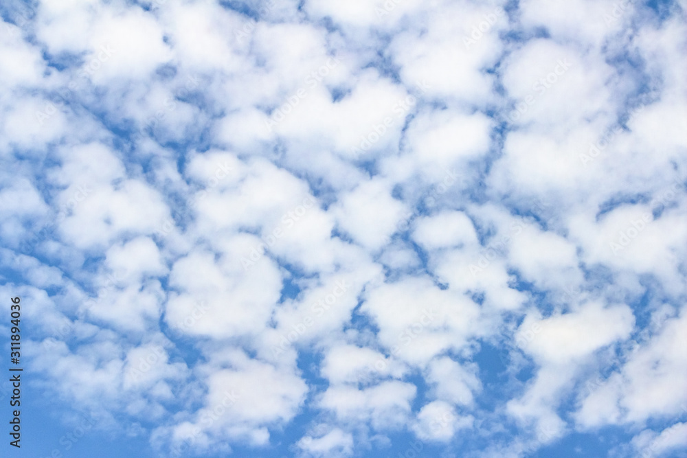 White clouds in the blue sky. Background. Texture White clouds in the blue sky. Background. Texture