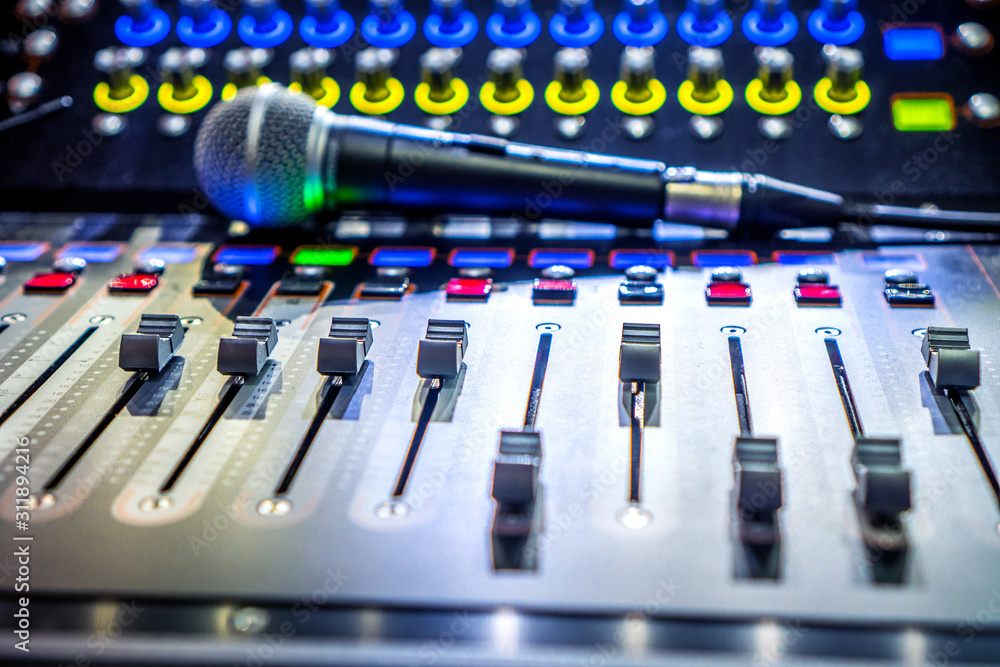 Sound effects soundboard and microphone. Sound and music industry background. Sound effects soundboard and microphone. Sound and music industry background.