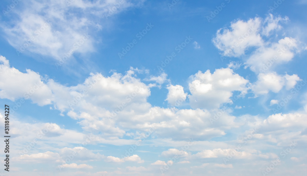 White clouds in the blue sky. Background. Texture