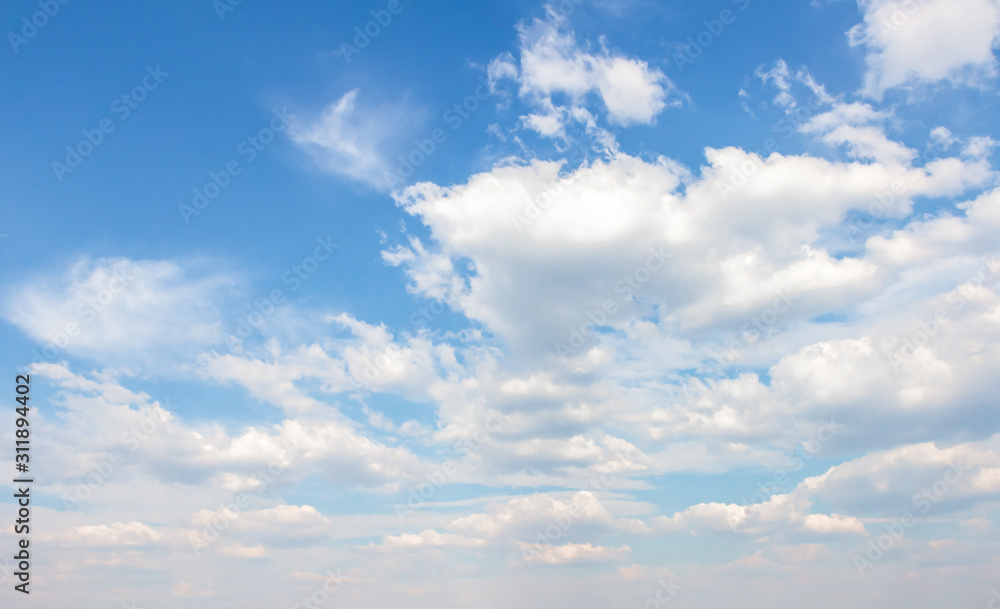 White clouds in the blue sky. Background. Texture