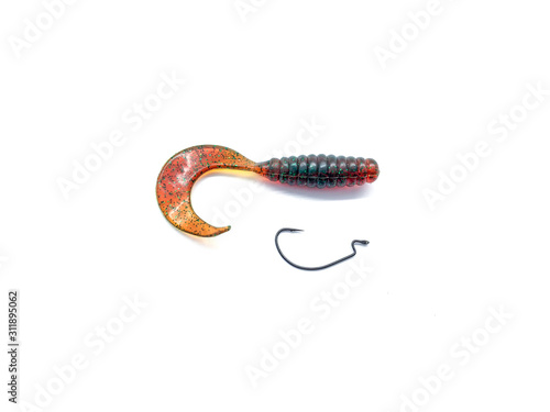 Twister fishing isolated on a white background. Set of bait, hook and weight. Fishing composition. Silicone bait for spinning. Silicone worm. 