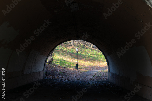 Dark Tunnel and Street Light at Riverside Park on the Upper West Side of New York City during Autumn