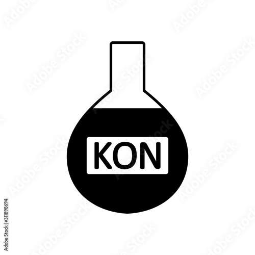 Laboratory glass with potassium hydroxide.