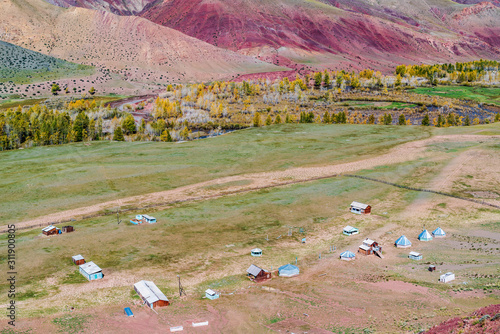 Old abandoned camp site in the valley of the Kyzylshin river. Kosh-Agachsky District, Altai Republic, Russia photo