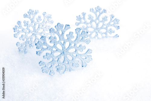 Christmas decoration, ornamental snowflakes and snow