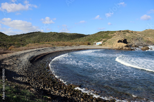 Escena de playa norte de Menorca