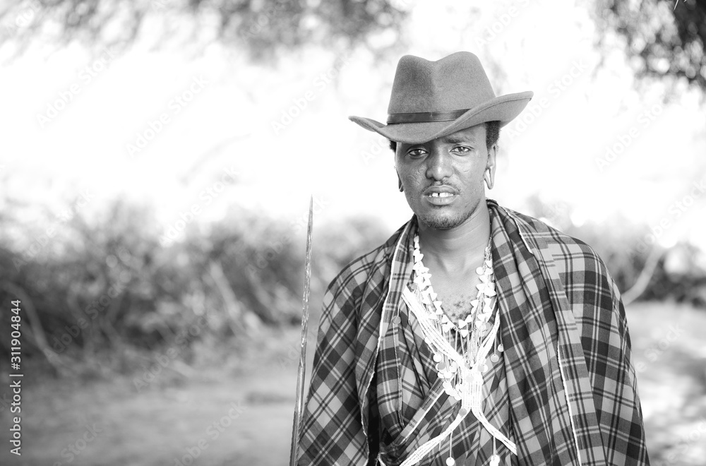 handsome maasai warrior in a cowboy hat