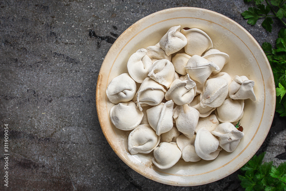 ravioli with filling (dumplings with filling, dough) menu concept. food background. top view. copy space ravioli with filling (dumplings with filling, dough) menu concept. food background. top view. copy space