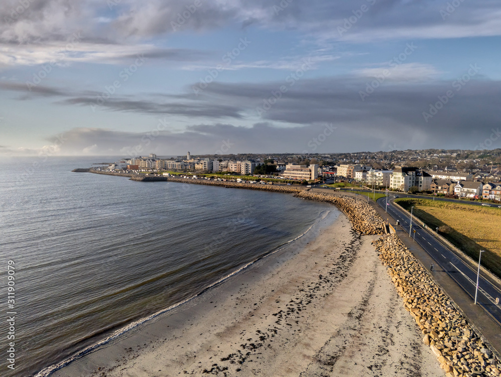 Grattan beach, Salthill promenade, Galway city, Ireland, Aerial view, Calm sky and waves of Atlantic ocean.