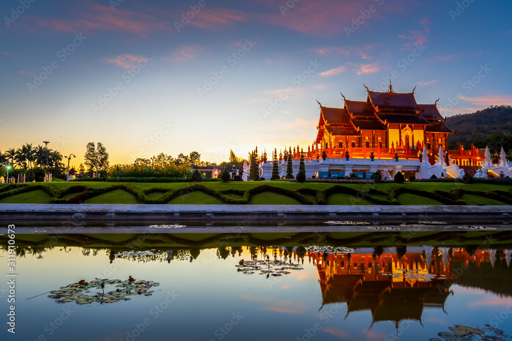 Obraz premium CHIANG MAI, THAILAND - DECEMBER 22, 2019 : The Royal Pavilion and reflection in pond in Chiang Mai. A large botanical garden and the most famous tourist attraction in Thailand.