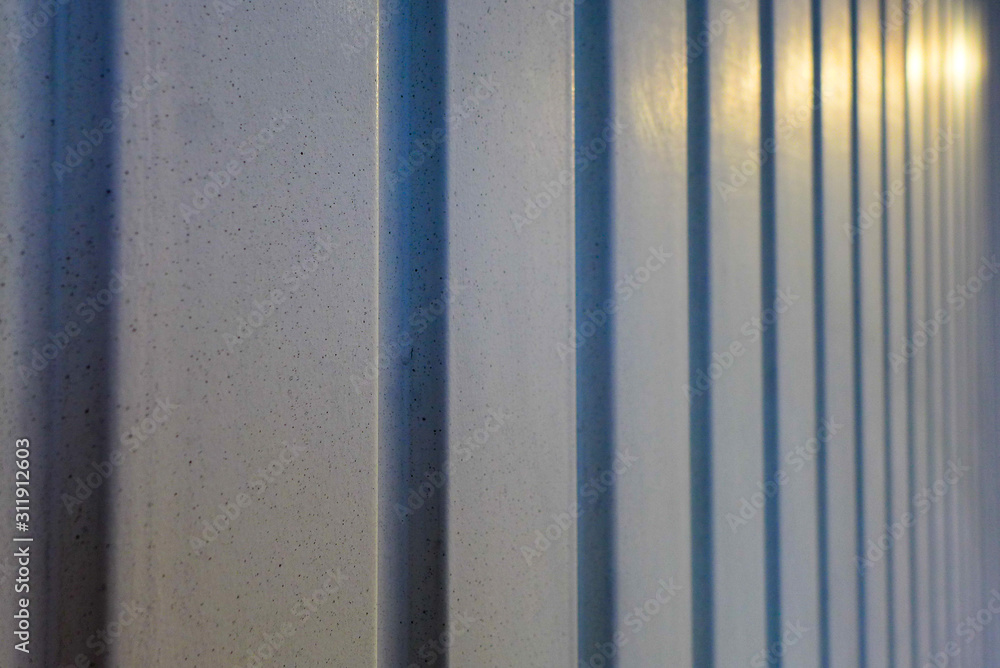 Fototapeta premium detail of a wall made of shimmering corrugated iron