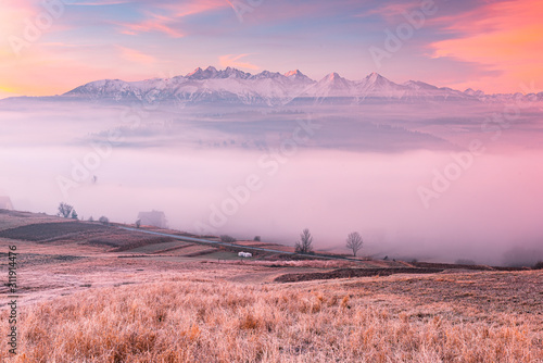 Panoramic View over Tatra Mountains in Snow over Fog at Sunrise in Pieniny, Poland