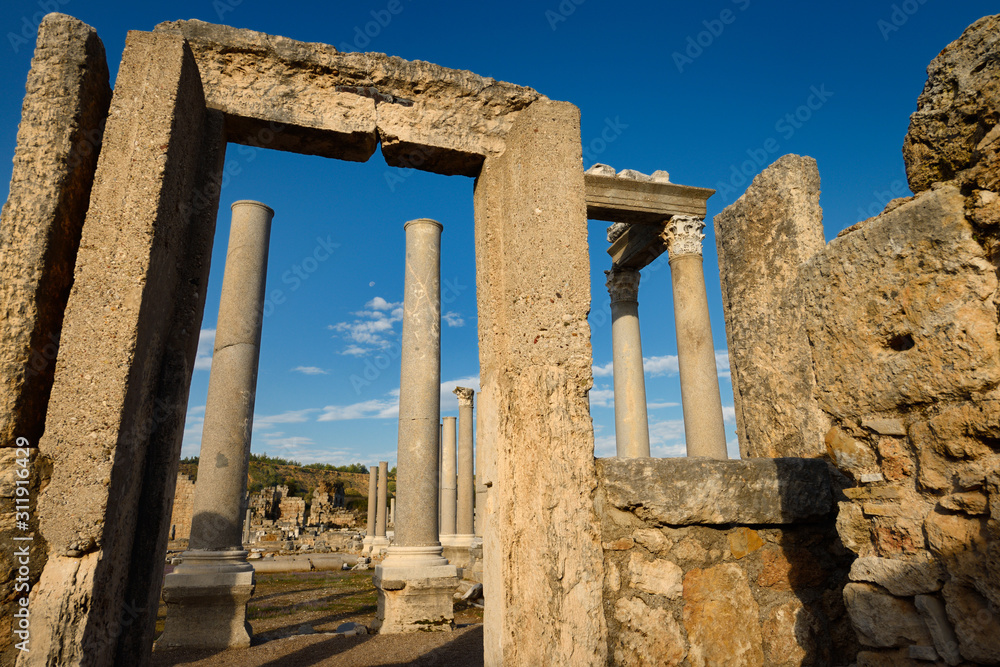 Stone door frame to the Agora ruins at the Perge archaeological site Turkey