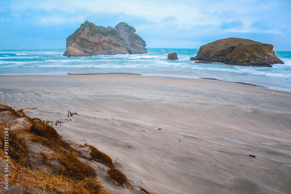 Wharariki Beach at the very northern point of the South Island, New Zealand