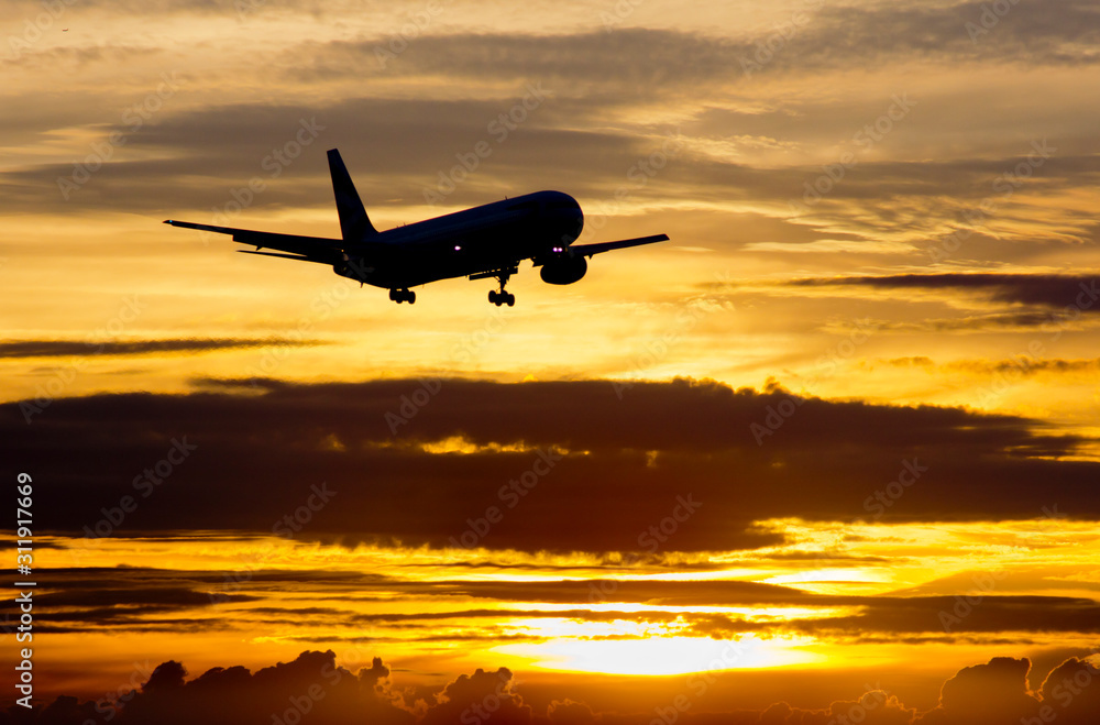 Airplane approaches to land at Heathrow airport