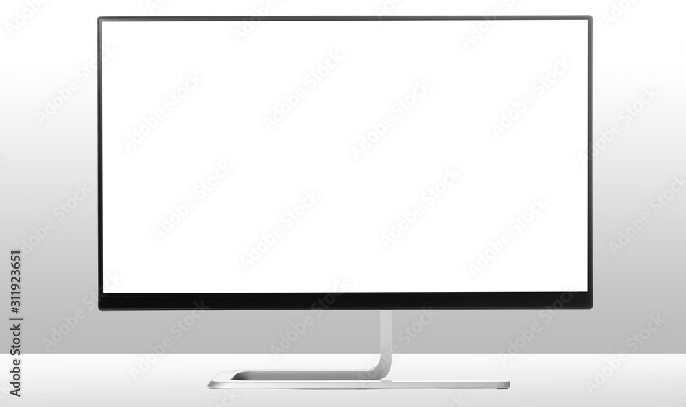 Fototapeta premium Modern monitor on white table and light background.