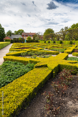 Rosenborg Castle Gardens (Kongens Have) in Copenhagen, Denmark on a sunny summer day photo