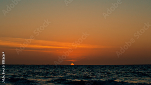 sunset over sea © nayan