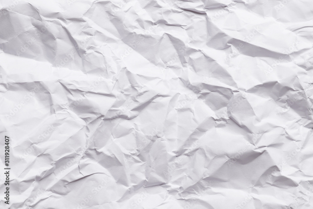 Crumpled paper as a white background. Crumpled paper as a white background.