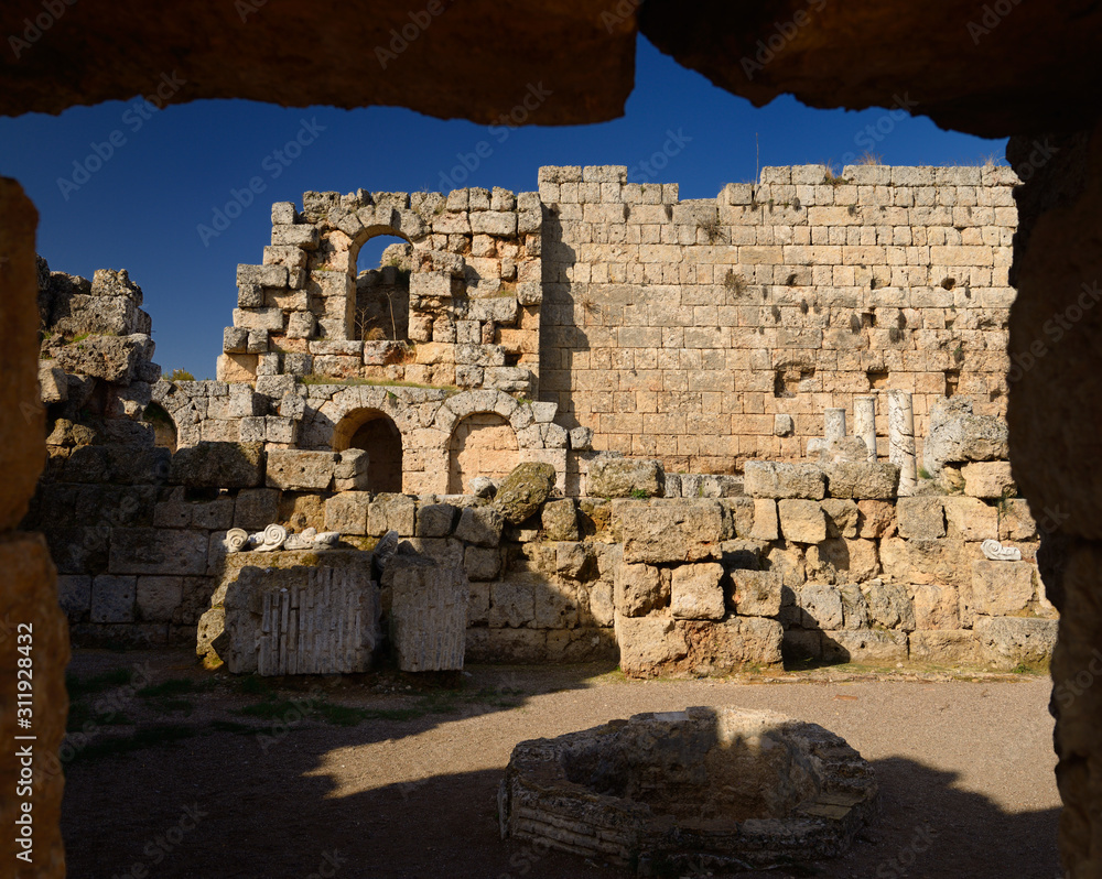 Ancient well in the ruins of Southern Bath area of Perge near Antalya Turkey Ancient well in the ruins of Southern Bath area of Perge near Antalya Turkey