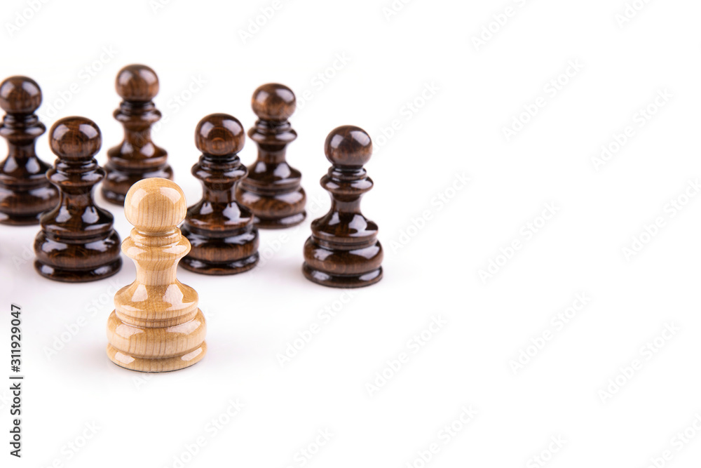 Single pawn against many enemies as a symbol of difficult unequal struggle Single pawn against many enemies as a symbol of difficult unequal struggle