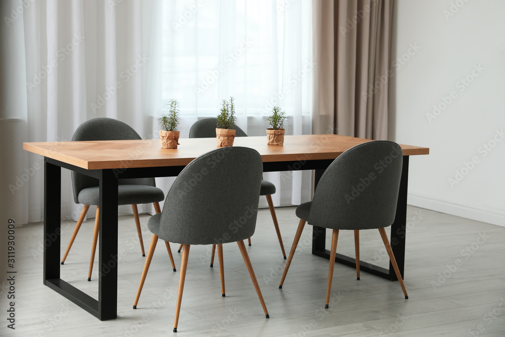 Modern room interior with chairs and table Modern room interior with chairs and table