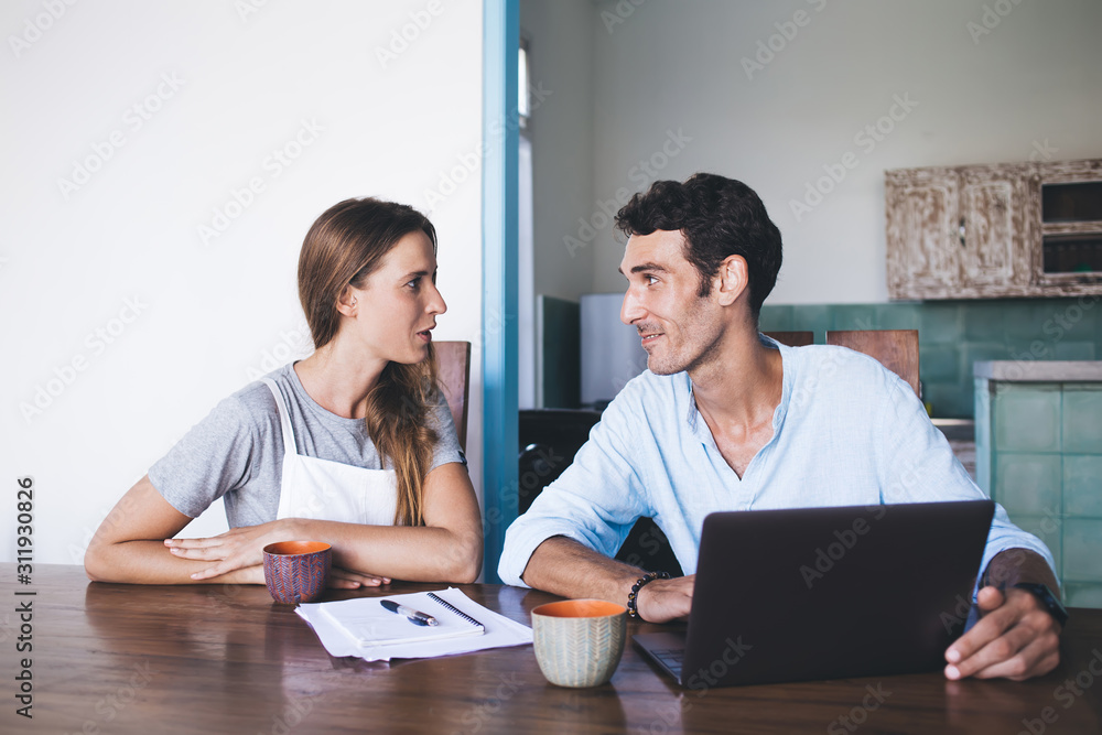 Couple in love having conversation at home Couple in love having conversation at home
