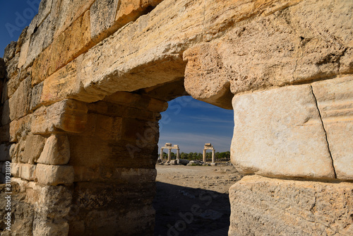 Wallpaper Mural Ancient Roman columns with lintels seen through the stone block south gate at Hierapolis Turkey Torontodigital.ca