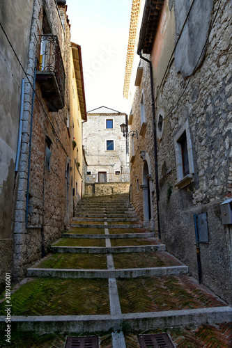 Campobasso, Italy, 24/12/2019. A narrow street between the old buildings of a medieval town © Giambattista