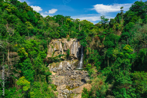 Aerial Drone view of waterfall Nauyaca in Costa Rica surrounded by the tropical rainforest