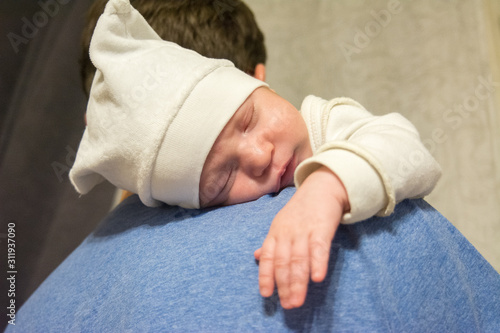 sleeping happy newborn babe close up, selective focus