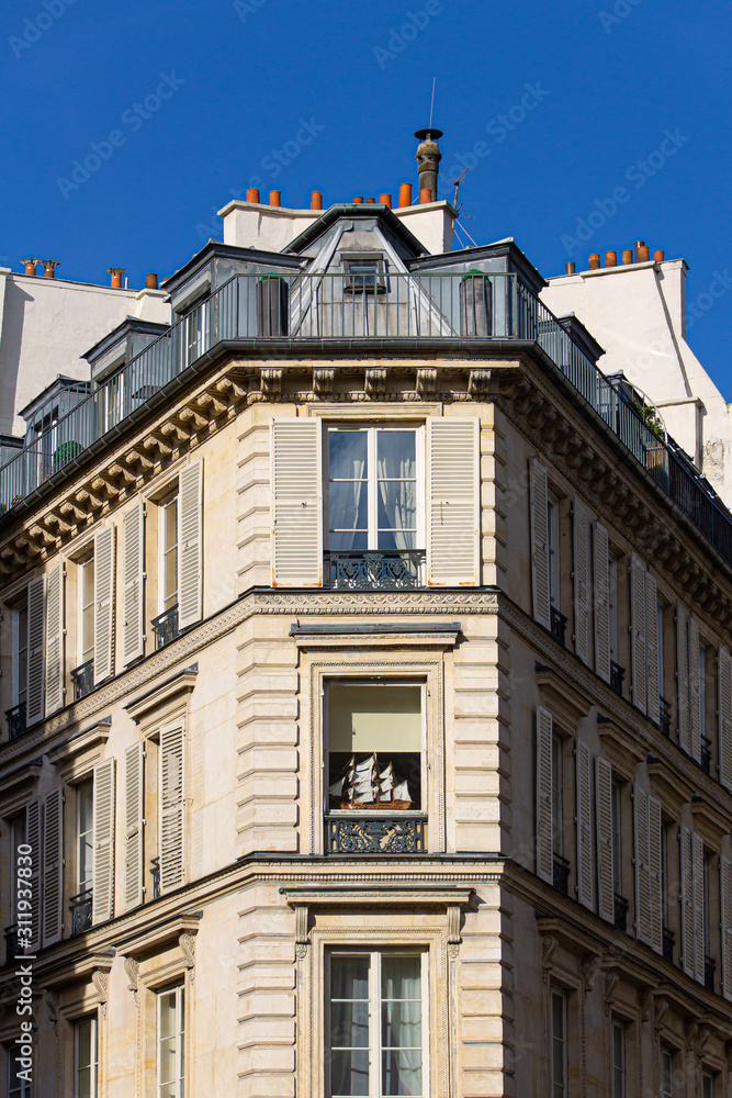 Paris, France - 15.05.2017: Streets of Paris. Blue sky, buildings.