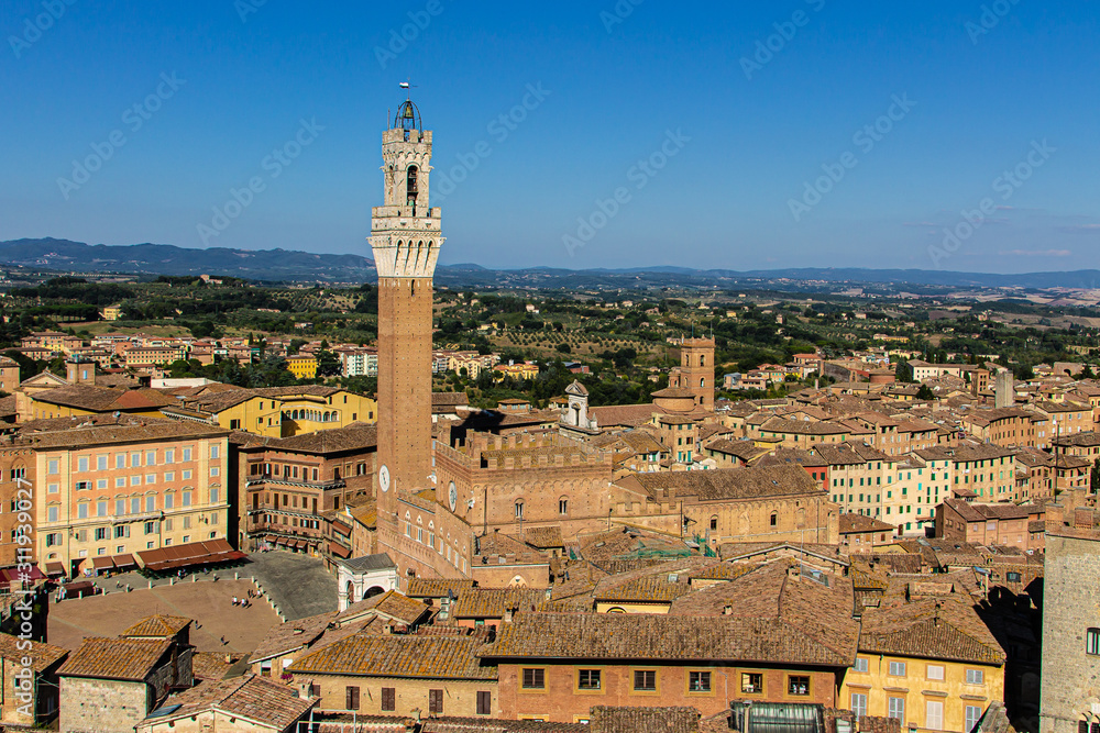 Sienna, Italy - 27.08.2017: Piazza del Campo with the Pubblico palace and Mangia tower