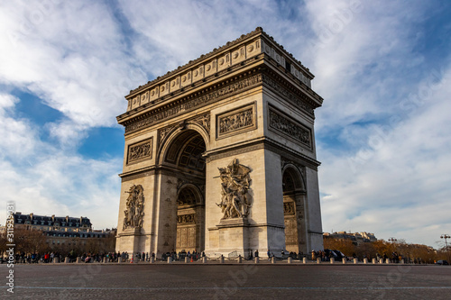 View of famous Arc de Triomphe in Charles de Gaulle square in Paris, France