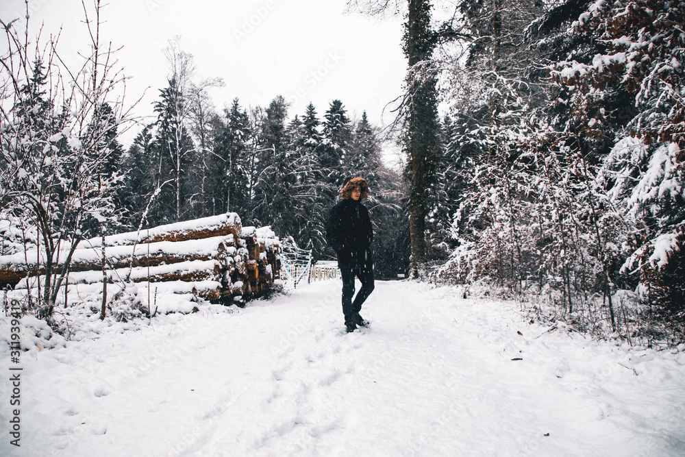 A Man In A Winter Forest, Switzerland.