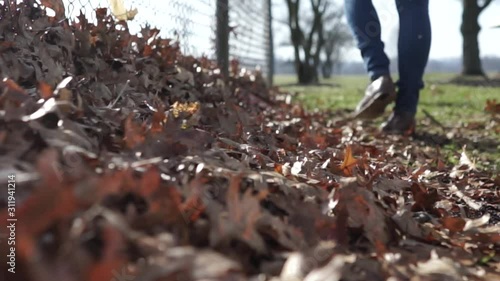 Wallpaper Mural man walking in autumn Torontodigital.ca