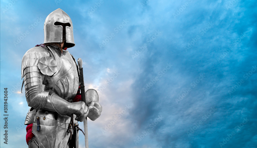 Knight in shiny metal armor. Reliable security and insurance. Copy space. Knight in shiny metal armor. Reliable security and insurance. Copy space.