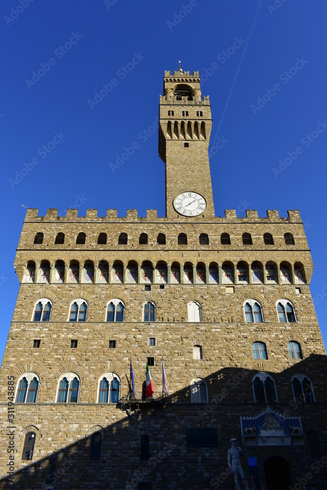 Palazzo Vecchio with blue sky. Florence, Italy.