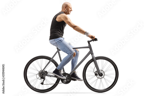 Bald guy riding a bicycle