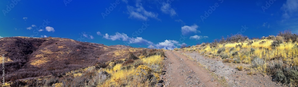 Hiking Trails in Oquirrh, Wasatch, Rocky Mountains in Utah Late Fall with leaves. Backpacking, biking, horseback through trees in the Yellow Fork and Rose Canyon by Salt Lake City. United States of Am