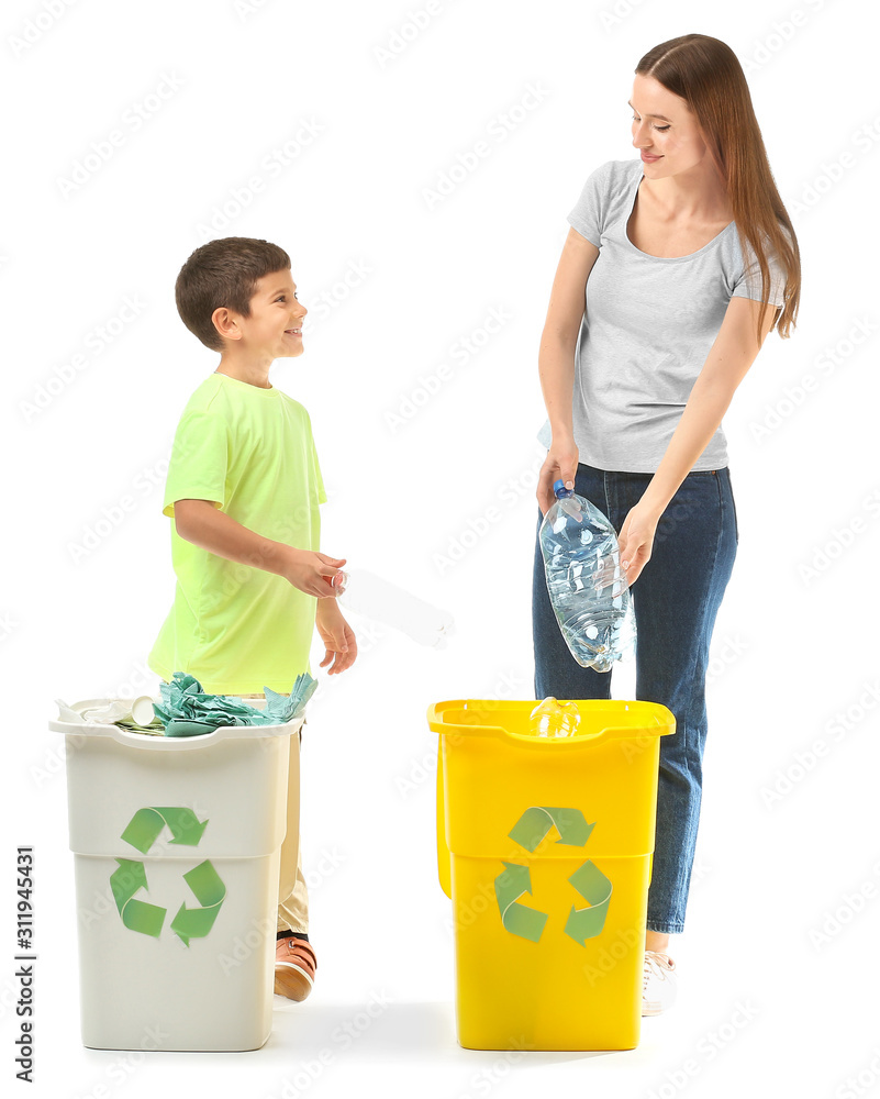 Mother and son with containers for garbage on white background. Concept of recycling Mother and son with containers for garbage on white background. Concept of recycling