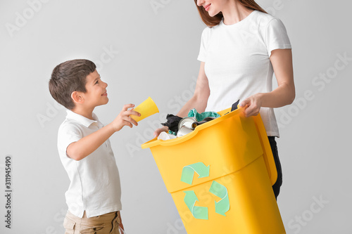 Mother and son with contain...