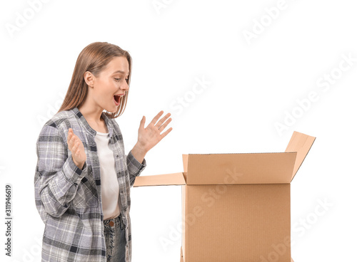 Excited young woman with op...