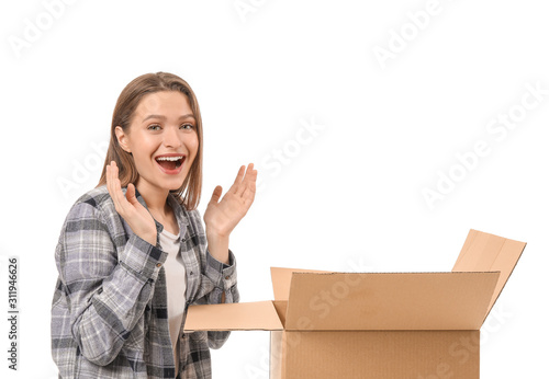 Excited young woman with op...