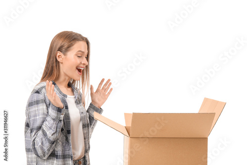 Excited young woman with op...
