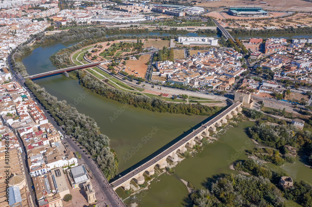 Aerial view of the old city of Cordoba and Romano Bridge. Spain