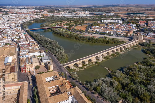 Aerial view of the old city of Cordoba and Romano Bridge. Spain © alexkazachok